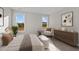 Serene bedroom with large windows, comfortable seating, and tasteful decor at 75 Brookhaven Dr, Spring Hope, NC 27882