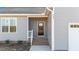 View of the home's front entrance, showcasing the front door and steps at 75 Brookhaven Dr, Spring Hope, NC 27882