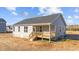 Gray house with wooden deck and steps at 75 Brookhaven Dr, Spring Hope, NC 27882