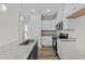 Modern kitchen with granite countertops and stainless steel appliances at 75 Brookhaven Dr, Spring Hope, NC 27882