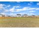 Expansive grassy backyard is enclosed by a sturdy wood fence for privacy and security at 8 Looping Horse Cir, Angier, NC 27501