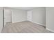 A bedroom features soft carpet and an open closet to the left of the image at 8 Looping Horse Cir, Angier, NC 27501