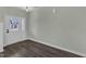 Entryway with hardwood floors and a white door with glass panes at 8 Looping Horse Cir, Angier, NC 27501
