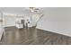 Open concept living space featuring a kitchen island and a hardwood floor at 8 Looping Horse Cir, Angier, NC 27501