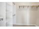 Spacious closet with built-in shelving and hanging rod at 808 Kinsman Ct, Raleigh, NC 27603