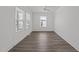 Sunlit bedroom with clean, white walls and modern flooring at 819 Cumberland St, Raleigh, NC 27610