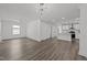 Bright, open layout featuring a modern living area, dining space, and kitchen at 819 Cumberland St, Raleigh, NC 27610