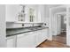 Traditional kitchen features bright natural light, double basin sink, and white cabinetry at 945 Sycamore St, Rocky Mount, NC 27801