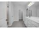 Double vanity bathroom with shower and modern fixtures at 91 Priming Way, Angier, NC 27501