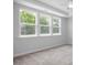 Bright bedroom with hardwood floors and large windows at 91 Priming Way, Angier, NC 27501