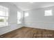 Formal dining room with hardwood floors and wainscoting at 91 Priming Way, Angier, NC 27501
