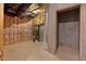 Unfinished basement featuring insulation, water heater, and open space at 101 Bonica Creek Dr, Garner, NC 27529