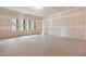 Large unfinished basement with bright windows and potential for customized layout at 101 Bonica Creek Dr, Garner, NC 27529