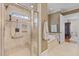 Tiled shower and soaking tub in the updated bathroom, perfect for relaxing after a long day at 101 Bonica Creek Dr, Garner, NC 27529