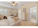 Bedroom with carpet, ceiling fan and natural light from the windows at 101 Bonica Creek Dr, Garner, NC 27529