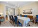 Elegant dining room with hardwood floors, classic furniture, and stylish lighting at 101 Bonica Creek Dr, Garner, NC 27529