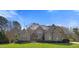 Charming brick home with manicured landscaping and a classic architectural design at 101 Bonica Creek Dr, Garner, NC 27529