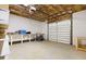 Spacious garage with a workbench, offering ample storage and functionality at 101 Bonica Creek Dr, Garner, NC 27529