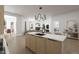 Stylish kitchen island with seating and an open layout to the cozy living areas at 101 Bonica Creek Dr, Garner, NC 27529