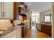 Gourmet kitchen featuring granite countertops, custom cabinets, and stainless steel appliances at 101 Bonica Creek Dr, Garner, NC 27529