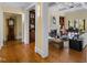 Open-concept living room with coffered ceilings, fireplace, and grand piano, perfect for gatherings at 101 Bonica Creek Dr, Garner, NC 27529