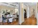 Bright living room with coffered ceiling, fireplace, and a grand piano, perfect for entertaining at 101 Bonica Creek Dr, Garner, NC 27529