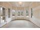 Bright sunroom with multiple windows, offering great natural light and views at 101 Bonica Creek Dr, Garner, NC 27529
