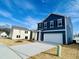 Charming two-story home with a 2 car garage and a well manicured lawn at 110 Gabriel Ct, Clayton, NC 27520
