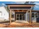 Modern covered patio with sliding glass doors at 110 Mohave Dr, Louisburg, NC 27549