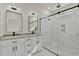 Double vanity bathroom with a large walk-in shower at 110 Mohave Dr, Louisburg, NC 27549