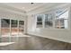 Bright dining room with hardwood floors and sliding glass doors at 110 Mohave Dr, Louisburg, NC 27549