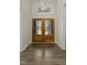 Bright entryway with hardwood floors and double doors at 110 Mohave Dr, Louisburg, NC 27549