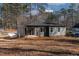 Gray house exterior with a covered patio at 110 Mohave Dr, Louisburg, NC 27549