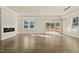 Spacious living area with hardwood floors and fireplace at 110 Mohave Dr, Louisburg, NC 27549