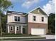 Charming two-story home featuring a two-car garage, and a mix of brick and neutral siding at 148 Babbling Brook Dr, Clayton, NC 27520