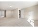 Spacious finished basement with neutral carpet and recessed lighting, perfect for entertainment or recreation at 1975 Meadowview Dr, Graham, NC 27253