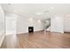 Open living space with fireplace, plenty of natural light, and easy access to other rooms at 1975 Meadowview Dr, Graham, NC 27253