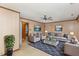 Relaxing living room with comfy seating and wood-paneled walls at 3505 Suffolk St, Durham, NC 27707