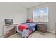 Cozy bedroom with a bed and nightstands at 36 Mae Ct, Roxboro, NC 27573