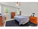 Comfortable bedroom with a dresser and ceiling fan at 36 Mae Ct, Roxboro, NC 27573