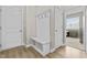 Bright entryway with built-in bench and storage at 36 Mae Ct, Roxboro, NC 27573
