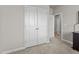 Bright hallway with double doors and closet at 36 Mae Ct, Roxboro, NC 27573
