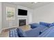 Spacious living room with fireplace and comfortable seating at 36 Mae Ct, Roxboro, NC 27573