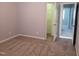 Bedroom with neutral paint, carpet flooring, and a door to the closet at 4202 Cherry Blossom Cir, Durham, NC 27713