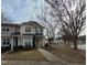 Inviting townhome with well-maintained landscaping and a welcoming front entrance at 4202 Cherry Blossom Cir, Durham, NC 27713
