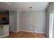 Open-concept living room with hardwood floors and neutral paint at 4202 Cherry Blossom Cir, Durham, NC 27713