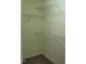 Walk-in closet with built-in wire shelving for organization at 4202 Cherry Blossom Cir, Durham, NC 27713