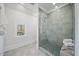 Bathroom with a large glass shower and a built-in bench at 4906 Tremont Dr, Raleigh, NC 27609