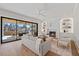 Bright living room features a fireplace, built-in shelving, and sliding doors to backyard at 4906 Tremont Dr, Raleigh, NC 27609