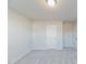 Simple bedroom with neutral wall paint, carpet, and a closet at 501 Hanover Shore Ln, Raleigh, NC 27610